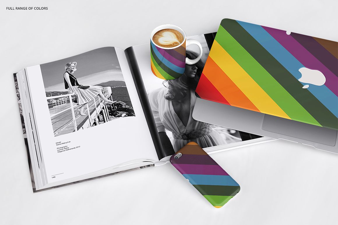 PSD mockup scene featuring a mug, phone case, and laptop case with diagonal rainbow stripes on a white background.