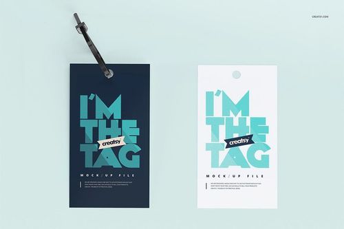 Two cable tie tag mockups displayed side by side, featuring bold turquoise text on navy and white backgrounds.