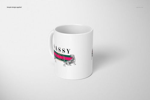 White ceramic 11oz mug with a sample graphic featuring text and illustrated animals, displayed on a light surface.