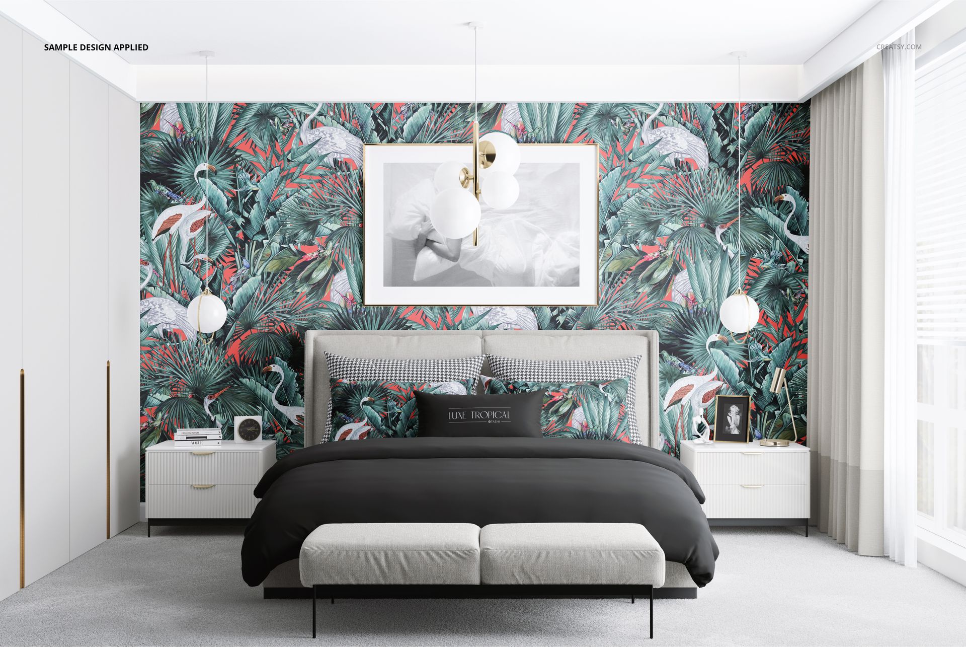 Front view of a stylish bedroom mockup showing a bed with monochrome bedding, tropical accent pillows, and leafy wallpaper.