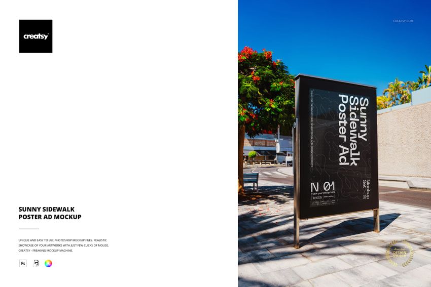 Outdoor poster ad mockup displayed on a sidewalk, featuring a black frame with trees and buildings in the background.