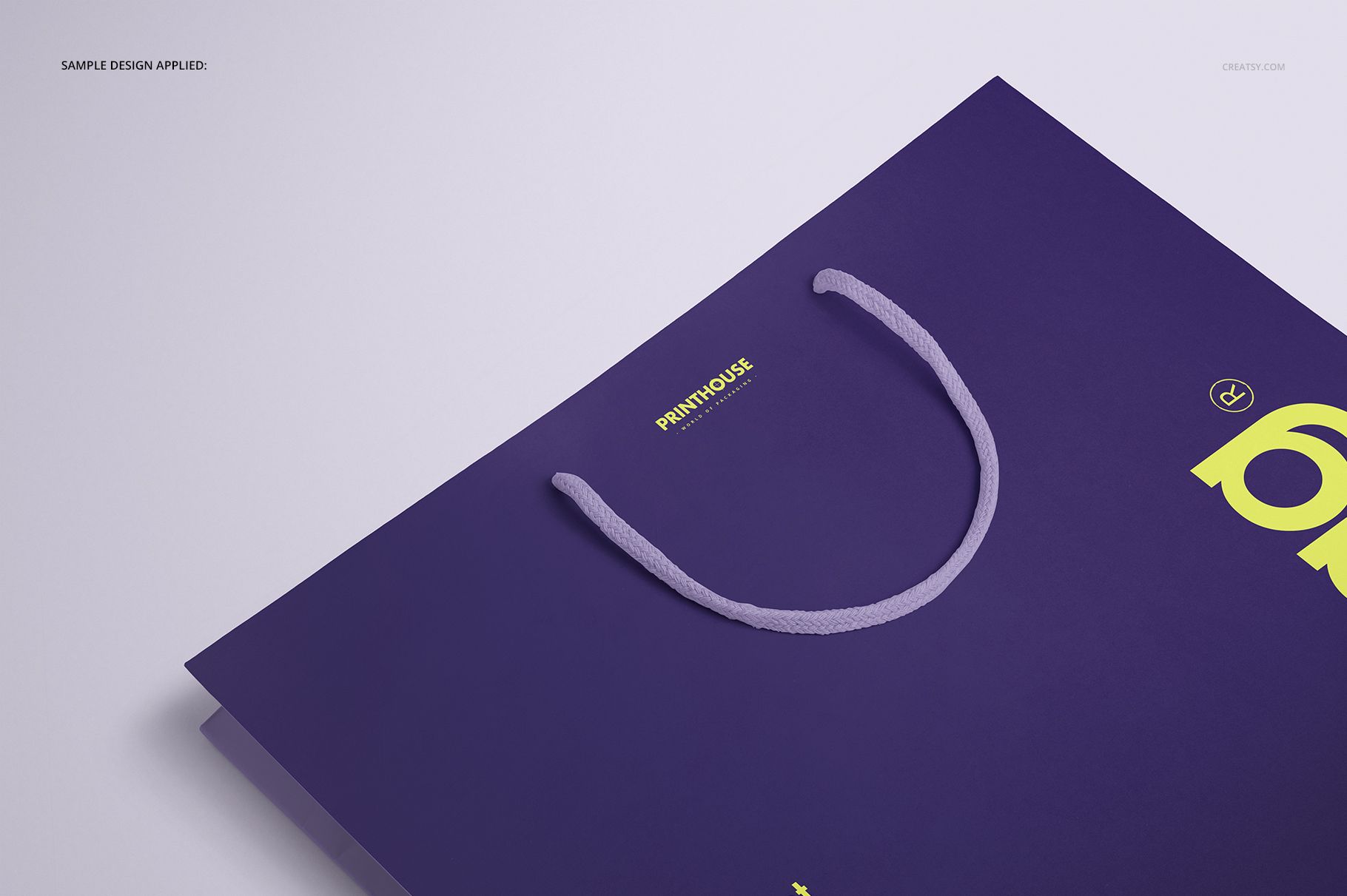 Eurotote bag mockup featuring a close-up angled view of a purple bag with light purple handles on a white surface.