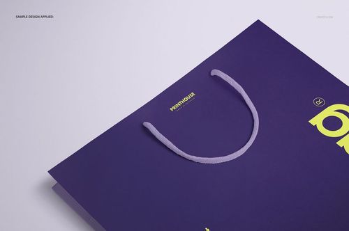 Eurotote bag mockup featuring a close-up angled view of a purple bag with light purple handles on a white surface.