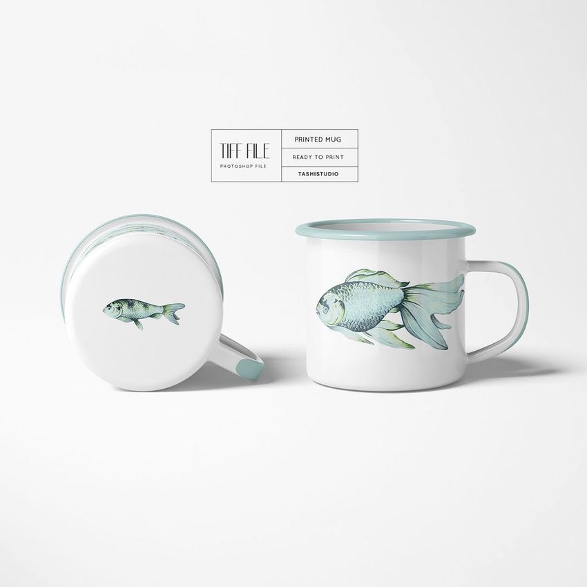 Enamel mug mockup featuring two white mugs with light blue rims and fish illustrations, shown on a plain white background.
