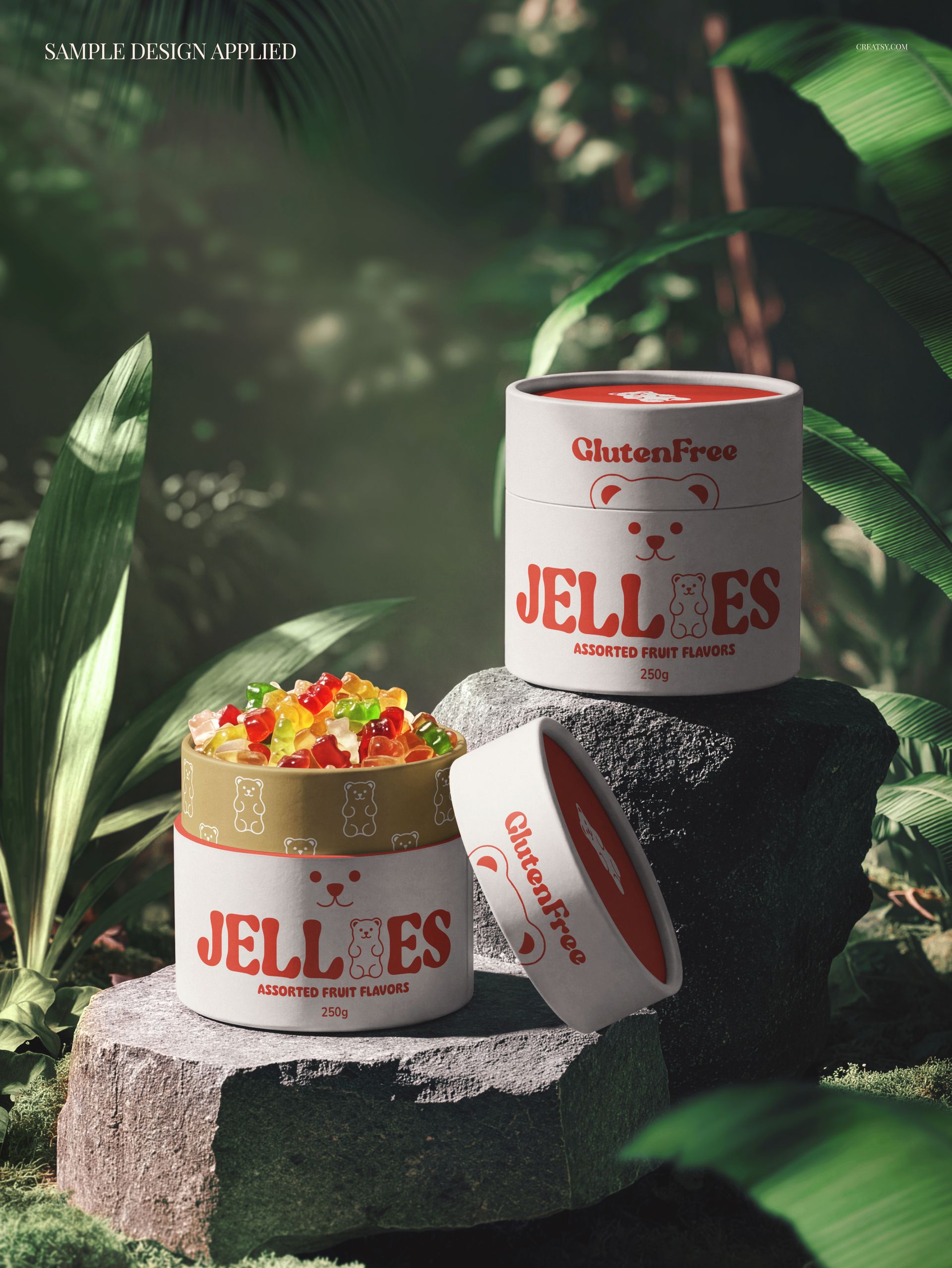 Assorted fruit jellies in round paper tubes mockup, surrounded by lush green plants in a natural jungle setting.