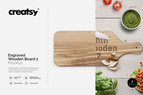Top view of a rectangular engraved wooden board mockup with a handle, placed on a light surface with sliced bread and vegetables.