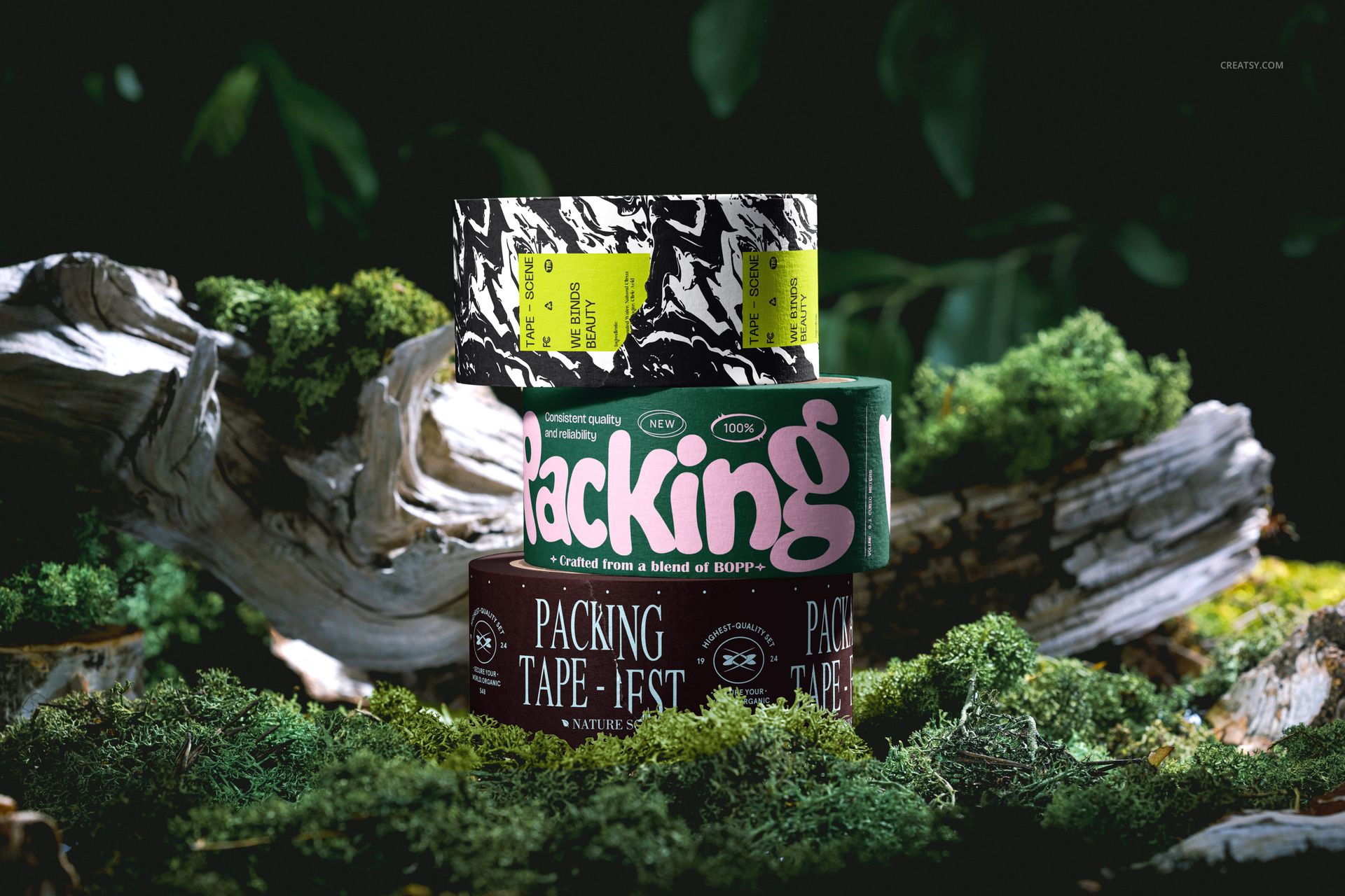 Stacked packaging tape rolls featuring colorful patterns rest on a bed of moss in a woodland mockup scene with natural lighting.
