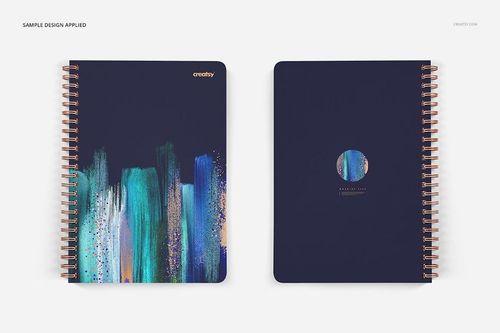 Notebook mockup set with square holes, displaying two spiral-bound stationery items with artistic blue and green cover designs.