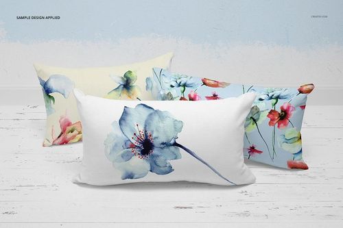 Rectangular pillow mockup set showing three pillows with colorful flower patterns in a bright, indoor setting.