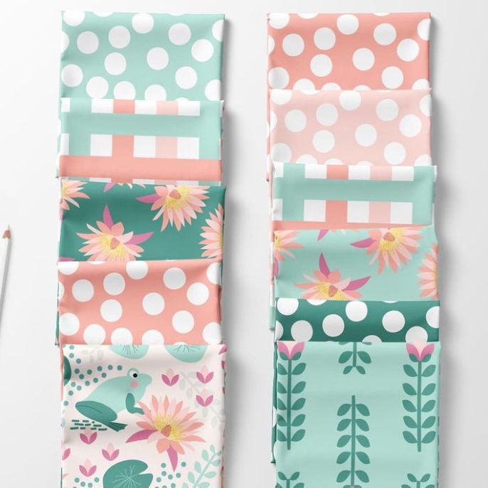 Folded fabrics mockup featuring two columns of colorful fabric pieces with polka dots, floral, and geometric patterns.