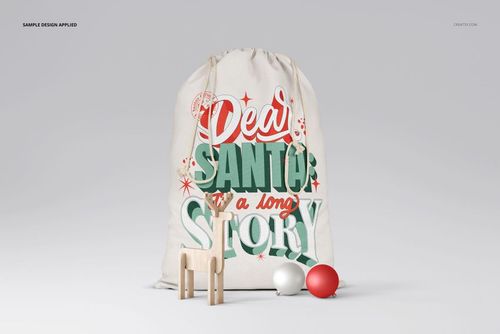 Christmas Santa bag mockup featuring a big fabric sack with holiday text design, displayed upright beside decorations.