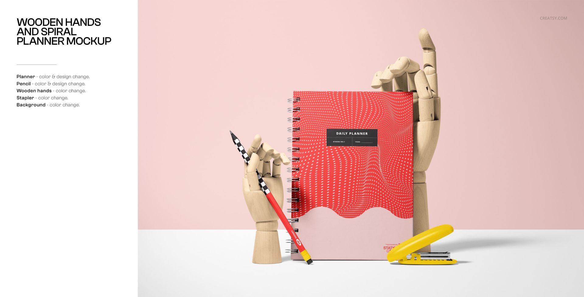 Spiral-bound planner mockup with red patterned cover, wooden hands, pencil, and yellow stapler against a pink background.