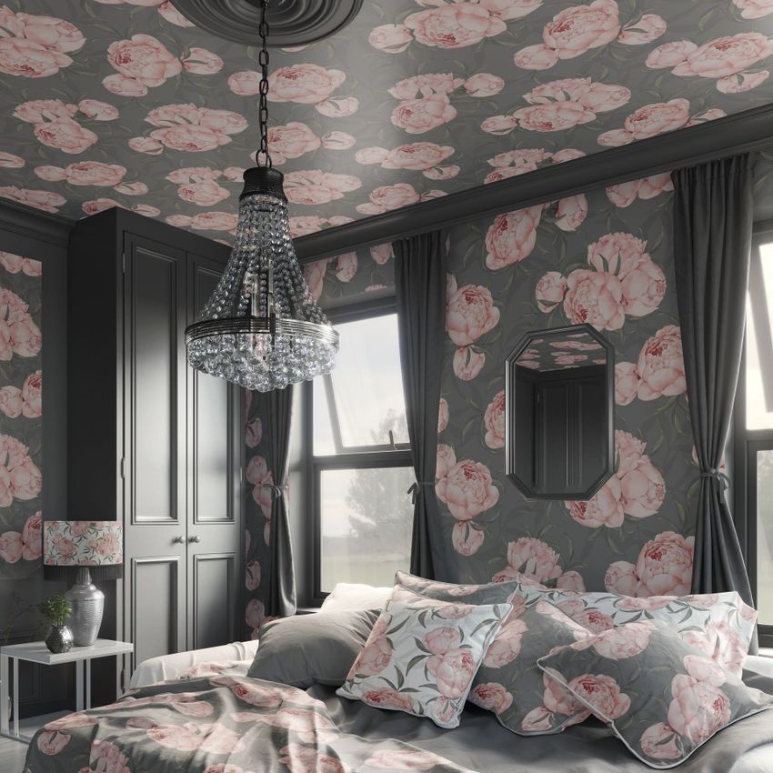 Bedroom mockup featuring floral wallpaper and matching bedding with pink peony patterns, gray walls, and a crystal chandelier.