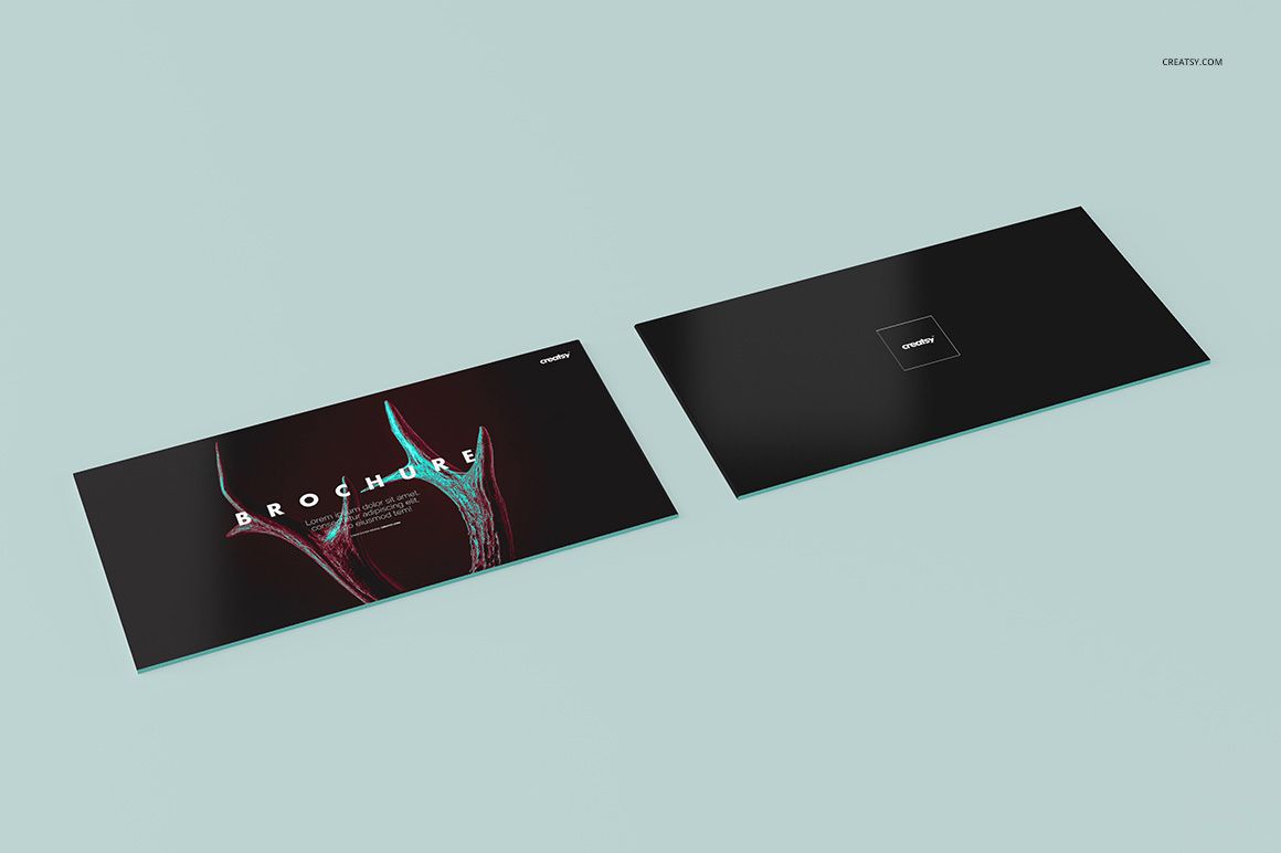 Brochure mockup set featuring two black brochures, one open and one closed, placed on a pale blue background.