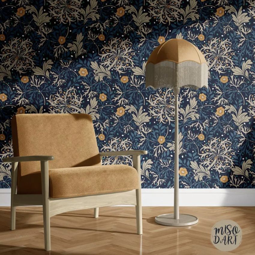 Interior mockup featuring a tan armchair and a vintage-style floor lamp set against a dark floral patterned wallpaper.