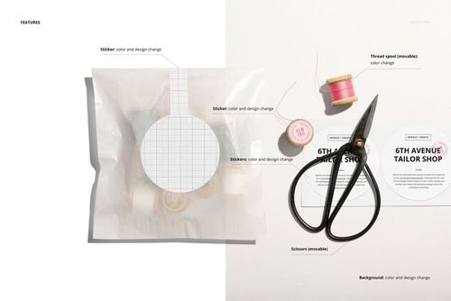 Glassine bag mockup with round stickers, scissors, and thread spools on a white background, top view.