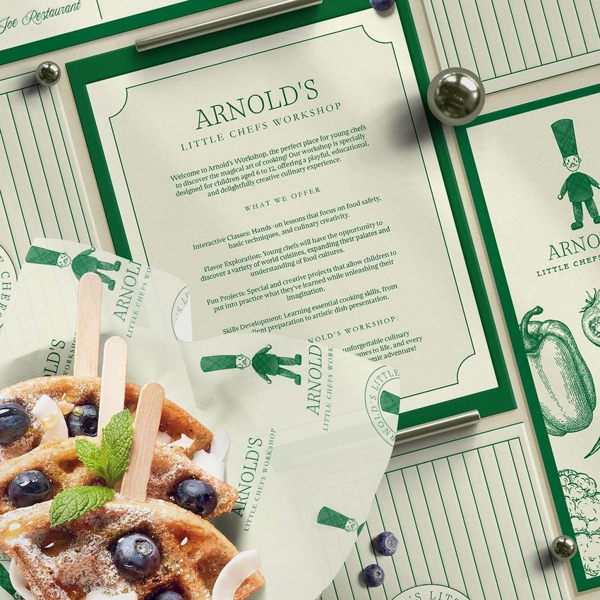 Food safe paper mockup featuring waffles on a stick with powdered sugar and mint, set over green and white printed menus.