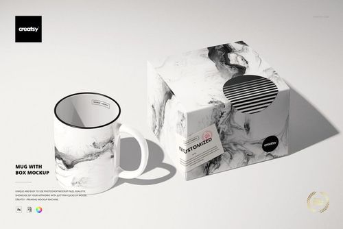 Front view of a white mug and packaging box featuring a swirling black marble design, presented as a mockup set.