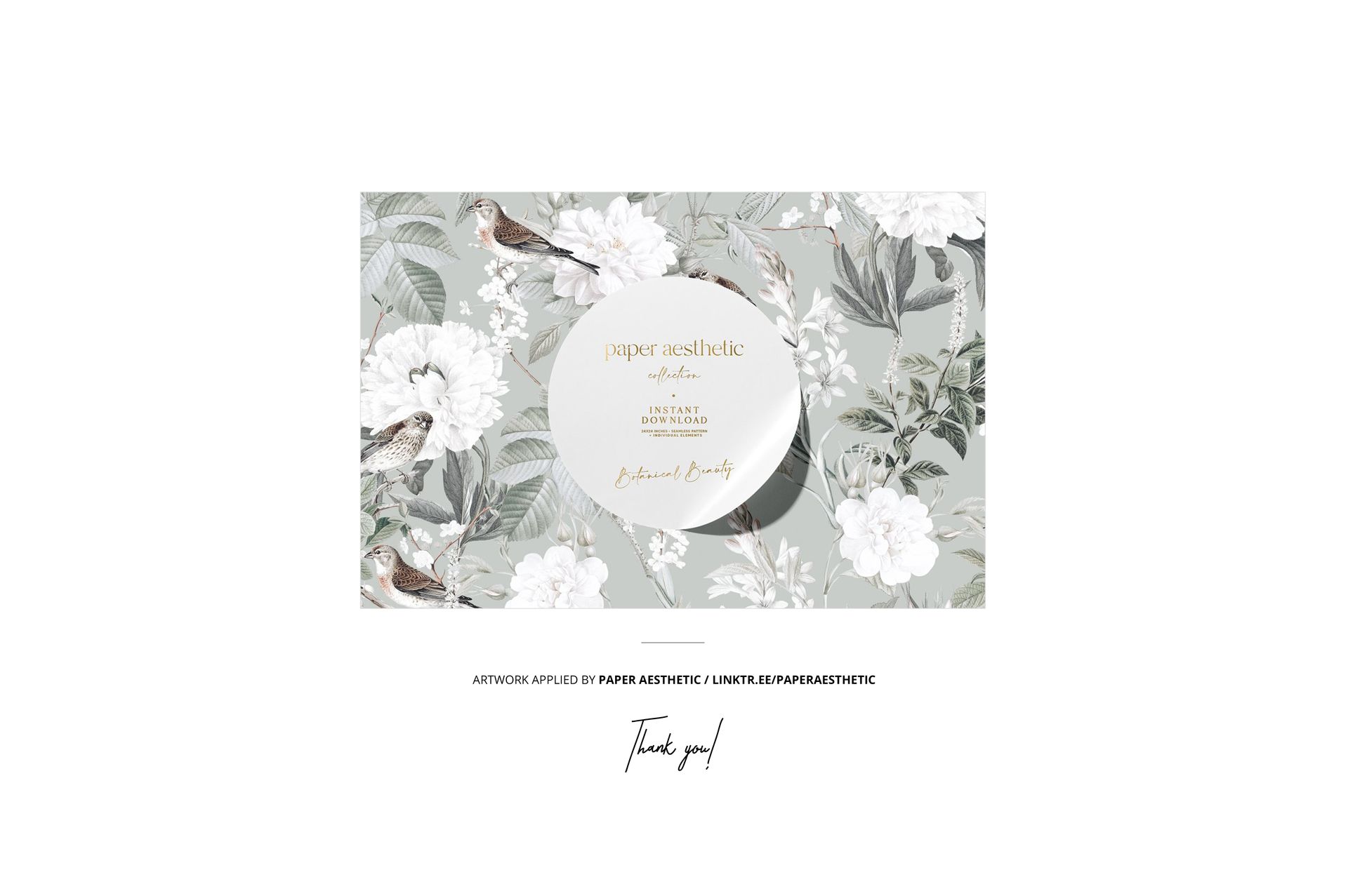 Mockup of a rectangular reading pillow displaying white flowers and birds on muted green, shown from the front.