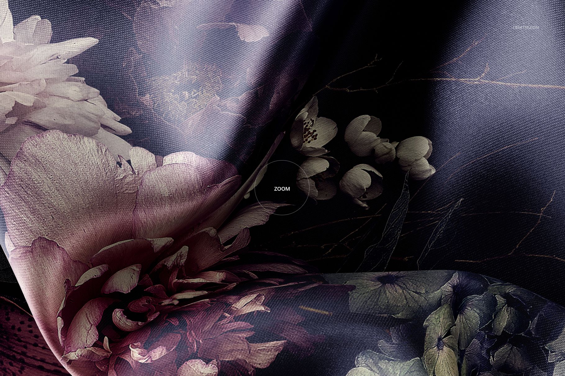 Detailed satin fabric mockup showing soft folds and a botanical pattern in shades of purple, cream, and green.