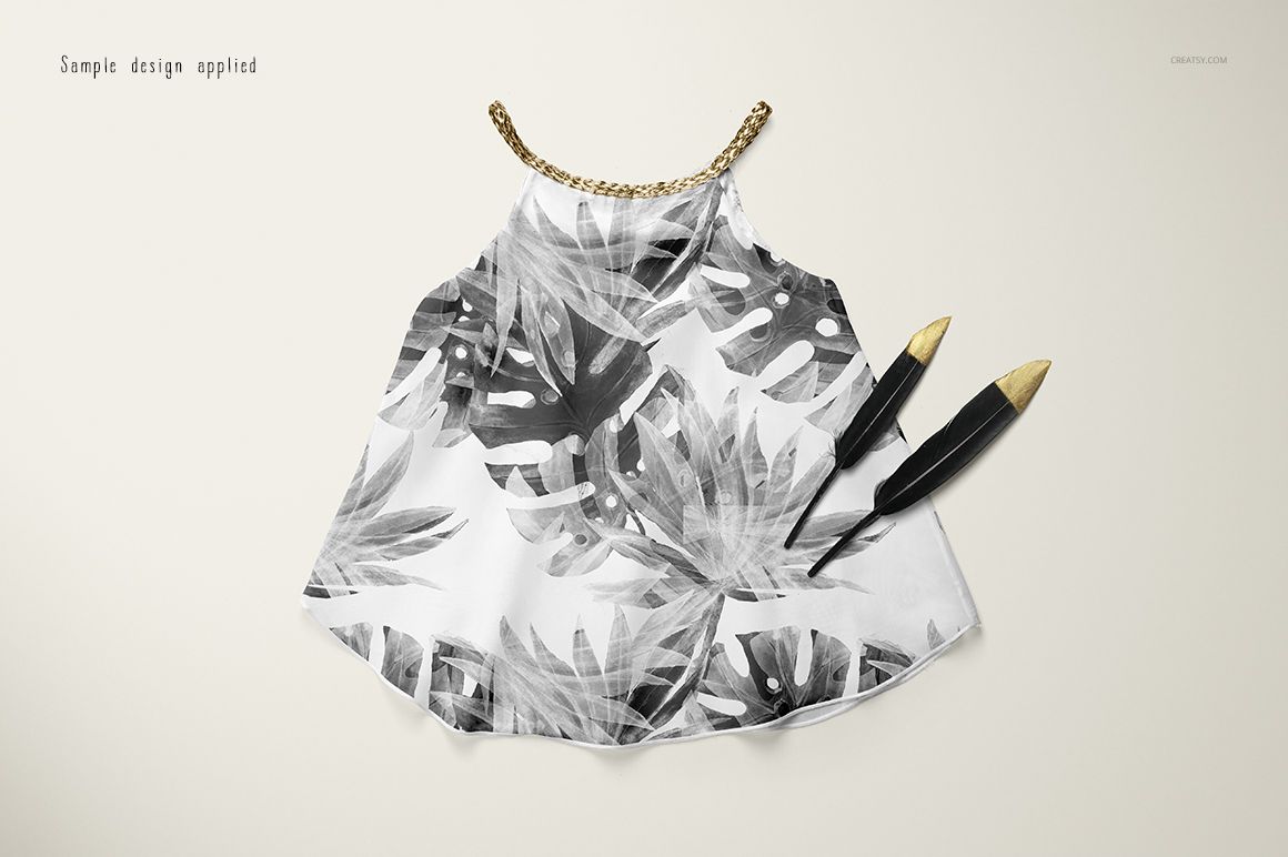 Front view of a baby summer set mockup featuring a sleeveless top with a black and white tropical leaf pattern on a light background.