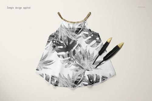 Front view of a baby summer set mockup featuring a sleeveless top with a black and white tropical leaf pattern on a light background.