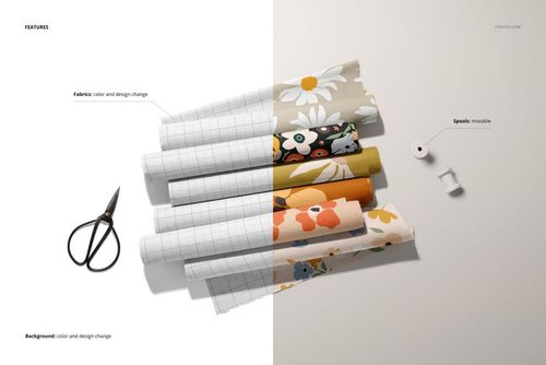 Six fabric rolls in different designs, scissors, and two spools displayed on a light and white background, PSD mockup.