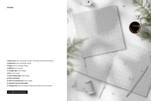 Top view of an open guest book mockup with grid pages, surrounded by pens, paper clips, and stationery items on a white surface.