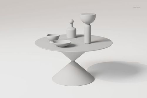 Round cone base dining table in matte light gray, shown with minimalist bowls and vases, front angled view.