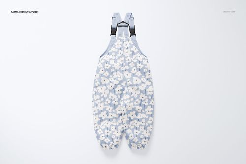 Front view of kids rainwear mockup featuring light blue overalls with white floral pattern on a plain background.