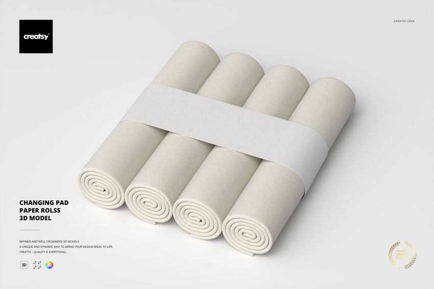 Four rolled changing pad papers in light beige color arranged side by side, viewed from a top angle on a plain background.