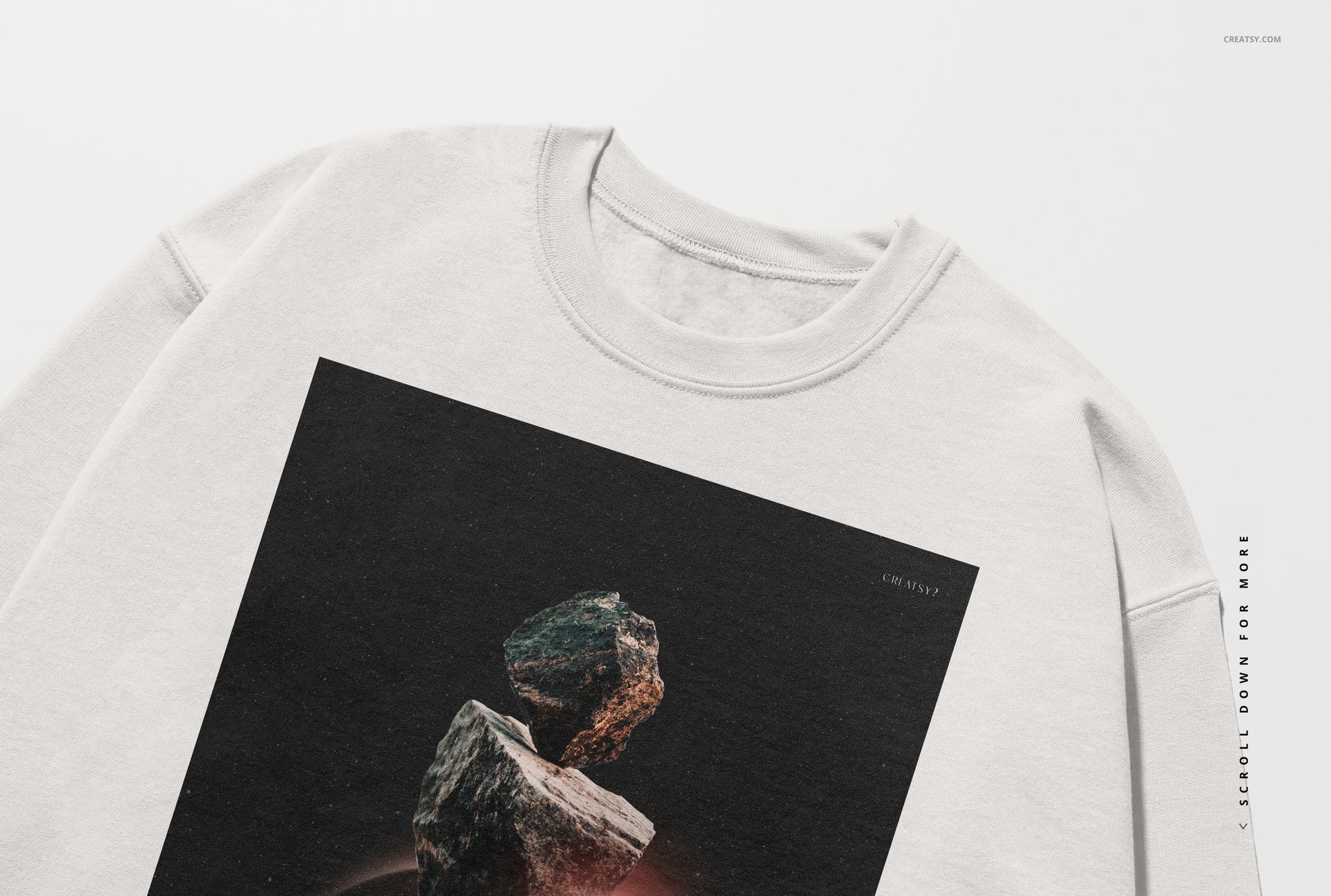 Gildan 18000 sweatshirt mockup in pale gray, with a dark rectangular graphic print, photographed from an overhead angle.