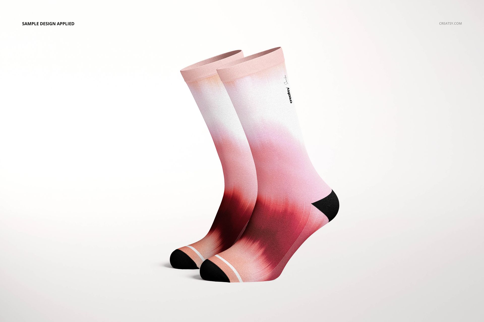 Long socks mockup featuring a pair with a gradient pink and red pattern, shown from a side angle on a white background.