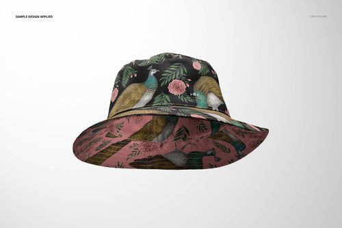 Front view of a reversible bucket hat mockup with a floral and bird pattern, displayed on a plain light background.