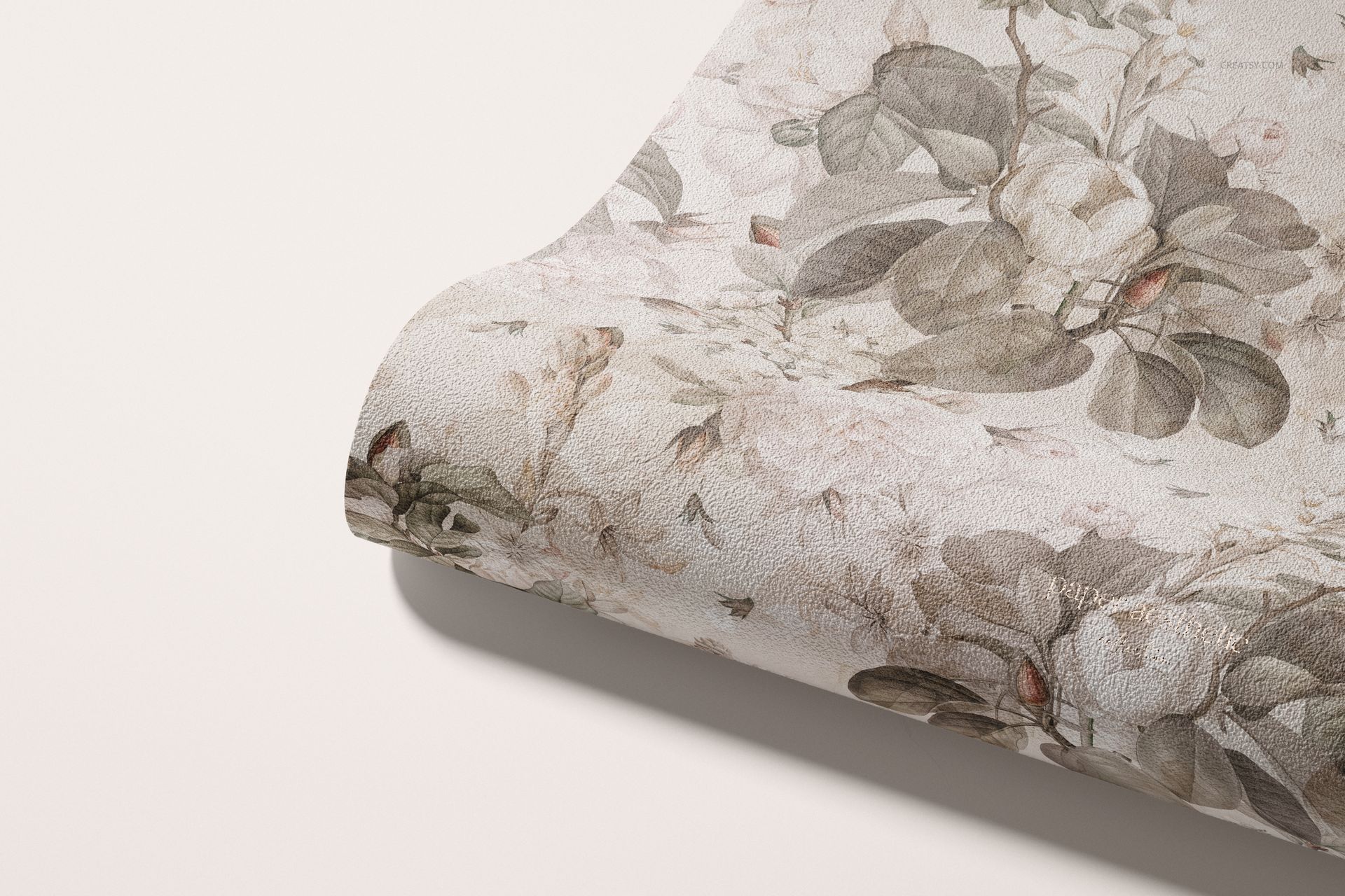 Close-up of a non-woven vinyl wallpaper mockup featuring a textured surface and soft botanical design.