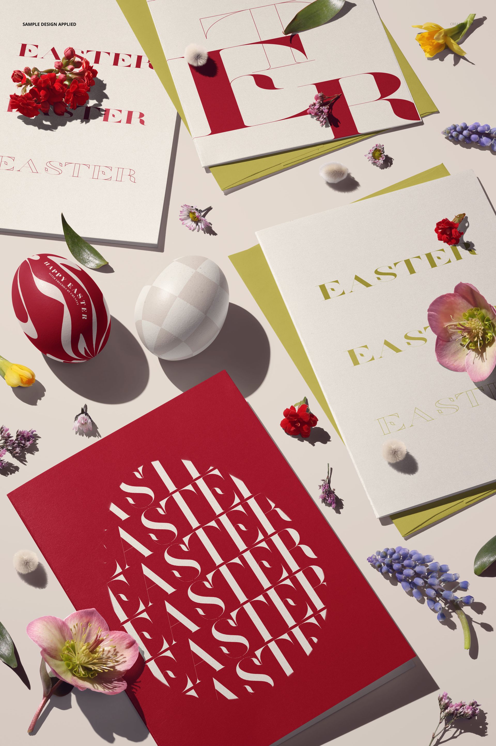 PSD mockup showing Easter cards in various colors alongside patterned eggs, scattered flowers, and leaves, top perspective.