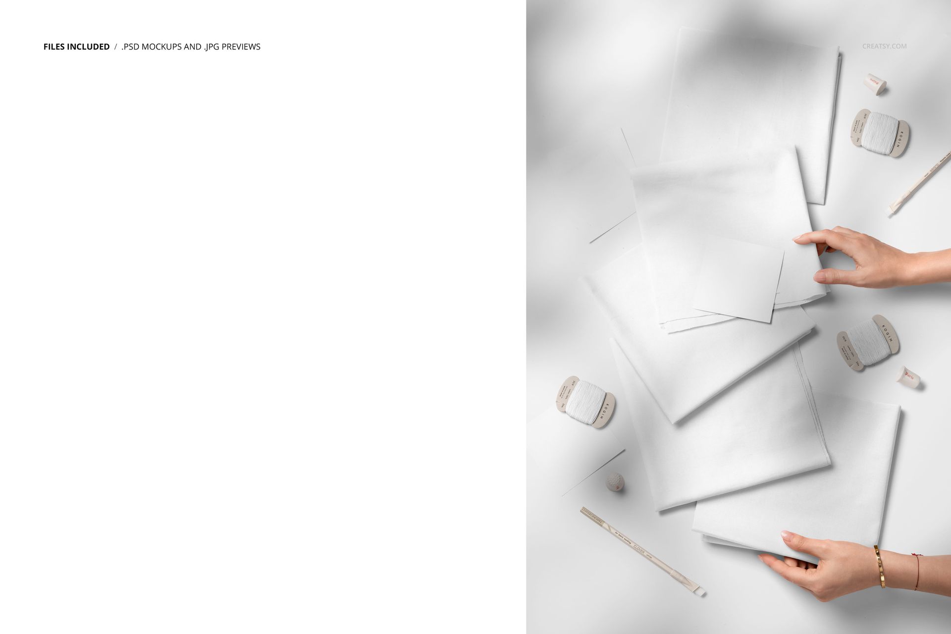 PSD mockup showing hands interacting with white fabric swatches and paper cards on a neutral background with props.