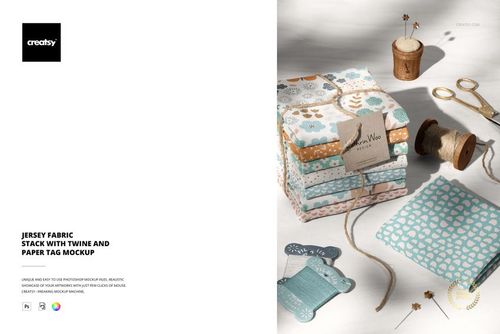 Stack of folded jersey fabric pieces in pastel colors with twine and a paper tag, shown in a top-side view mockup.