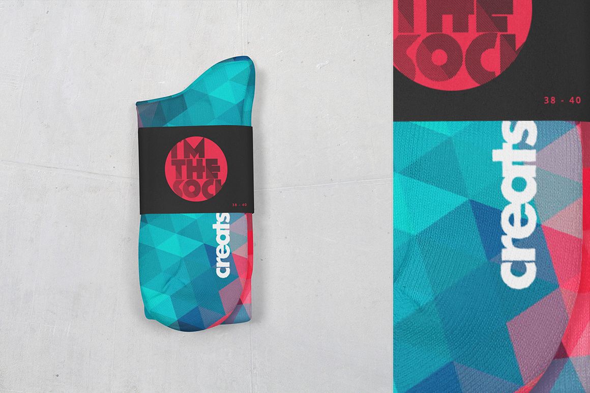 PSD mockup of knee high socks with colorful geometric print, black wrap label, and visible branding on a neutral background.