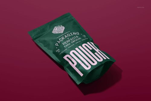 Stand up paper pouch mockup shown in perspective view, featuring large white lettering and a dark green surface.