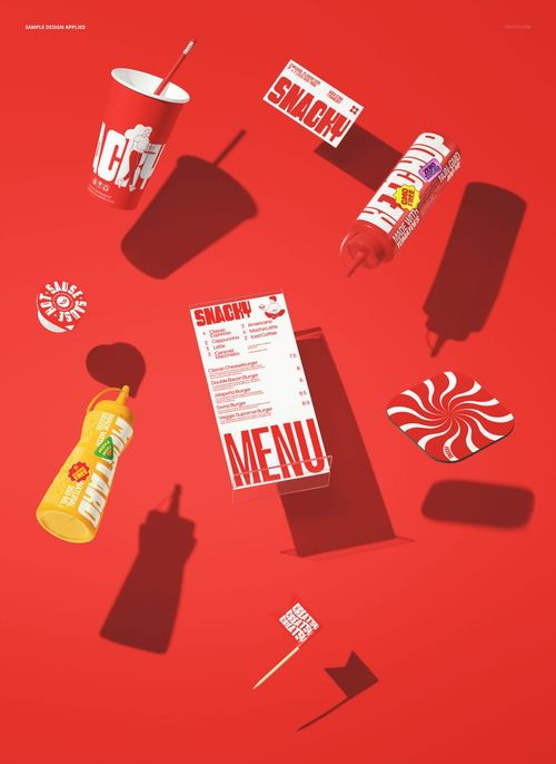 Floating fast food packaging mockup with cups, bottles, menu card, and branded wrappers on a vibrant red background.