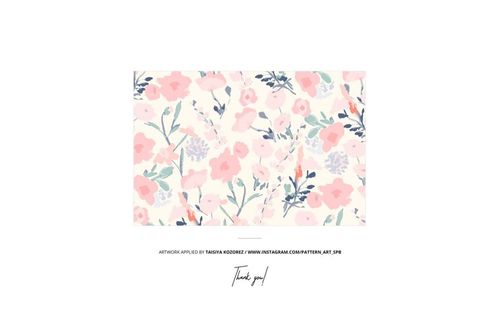 Top view of cotton fabric mockup featuring a pastel floral pattern with pink, purple, and green elements on white.