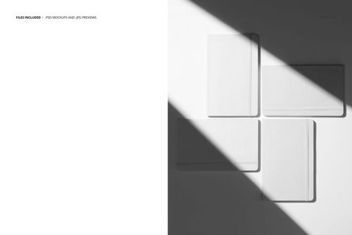 Stationery PSD mockup featuring four rectangular leather planners on a bright background with dramatic shadow.