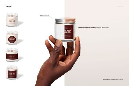 Hand holding a clear jar candle with a metallic lid and custom label, highlighting label and lid details for mockup.