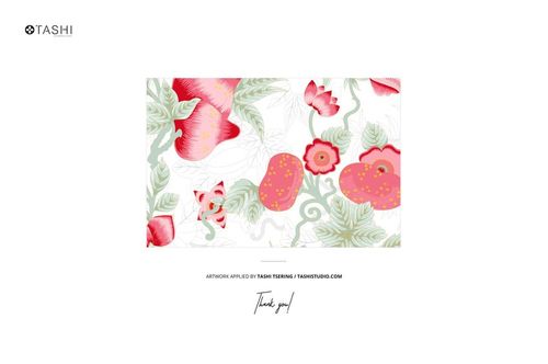 PSD mockup showing a stack of patterned jersey fabrics with red flowers, green leaves, and a branding tag in the scene.