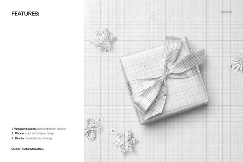 PSD mockup showing a square gift wrapped in grid paper, adorned with a bow and wicker Christmas ornaments on a white surface.