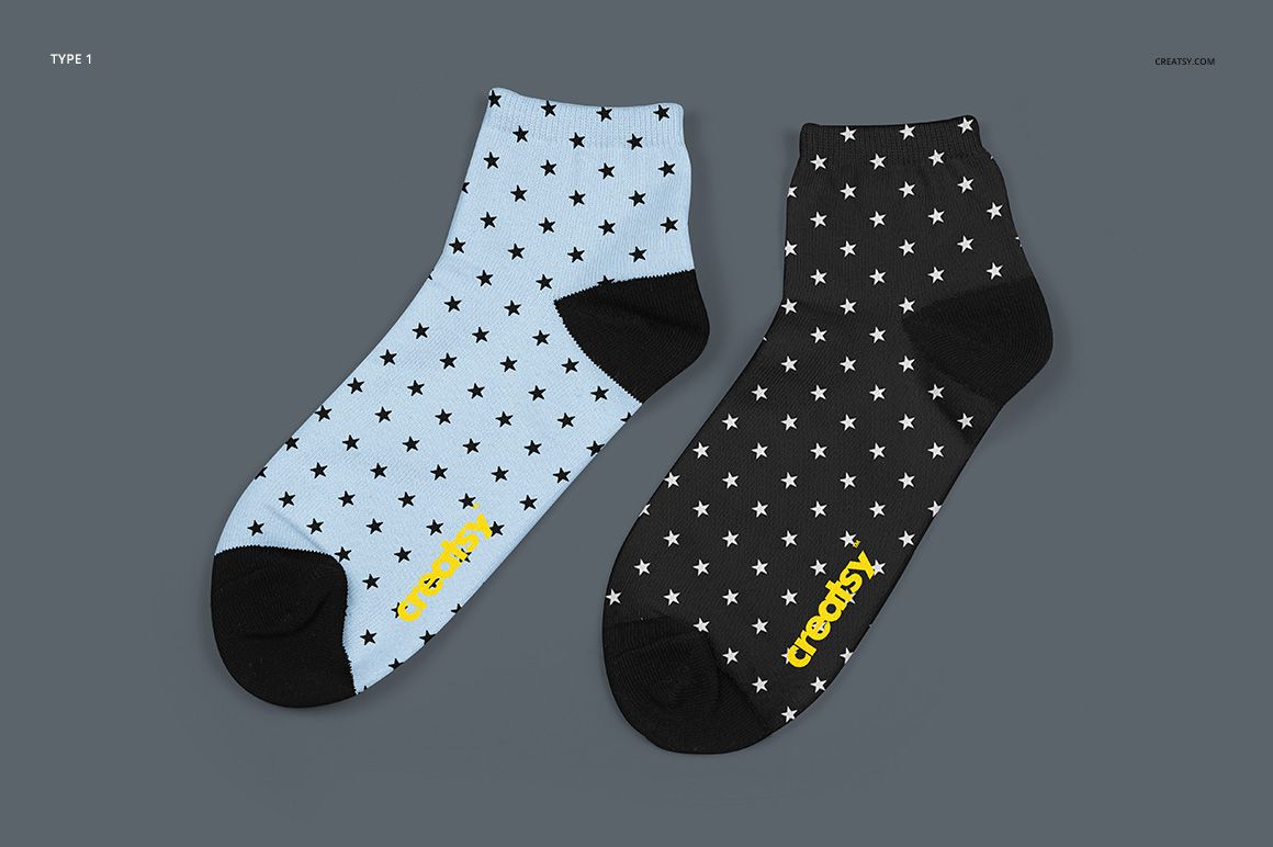 Pair of sublimation socks mockup shown from top view, featuring star patterns and black toes and heels.