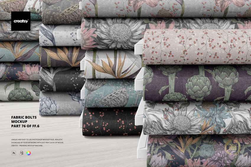 Fabric bolts mockup with various floral prints in gray, green, and pink hues, presented on a clean white background.