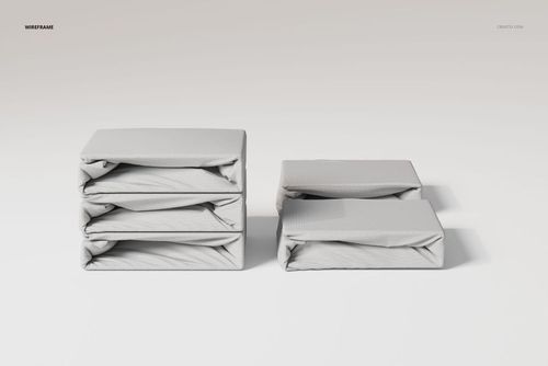 Stacked and folded fitted bedsheet set in light gray fabric shown on a plain background, front view.