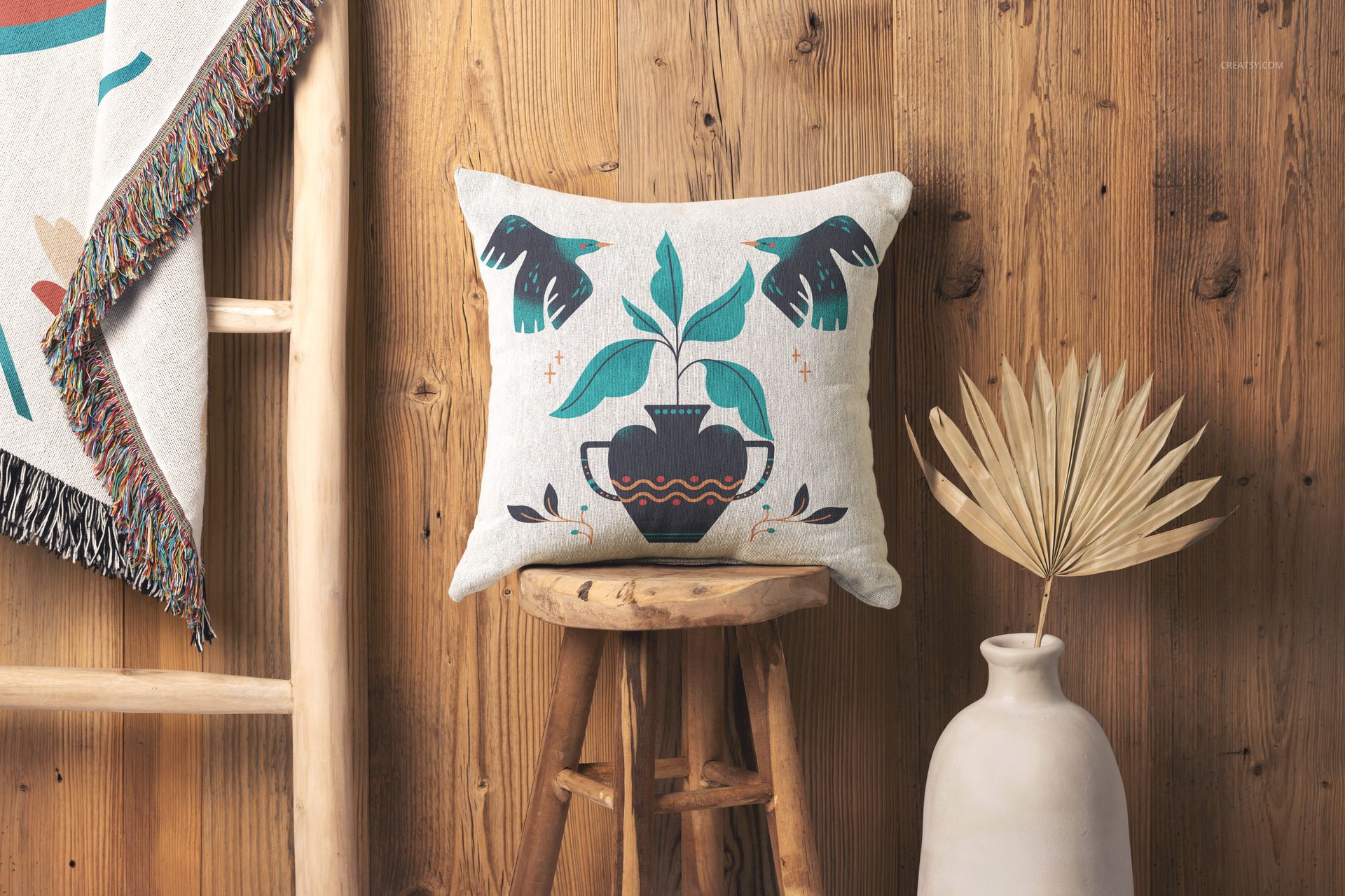 Front view of a 45x45cm woven pillow mockup with plant design, styled with wooden furniture and neutral props.